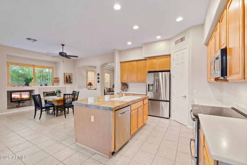 Kitchen opens to Family Room