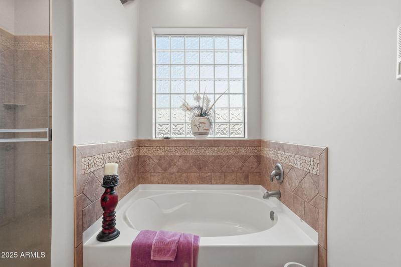 soaking tub in primary bathroom