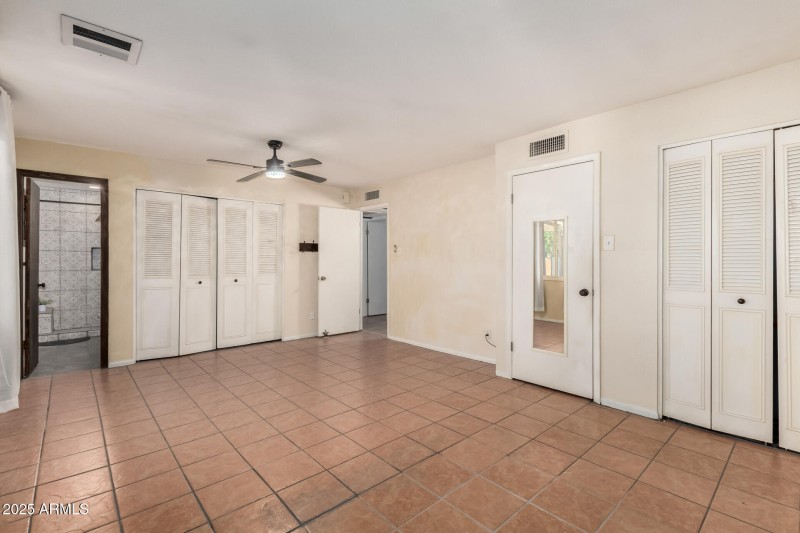 Primary bedroom has three closets