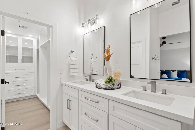 Primary Bath to Walk-in Closet