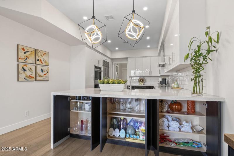 Image showing island cabinets open