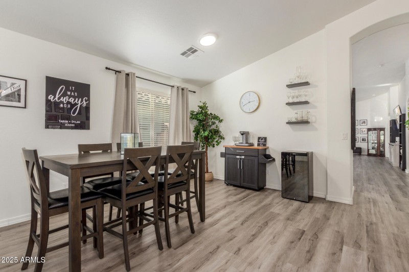 Dining area leading towards kitchen