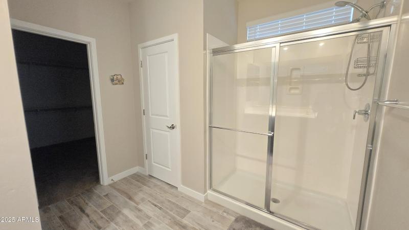 Master Shower and Linen Closet