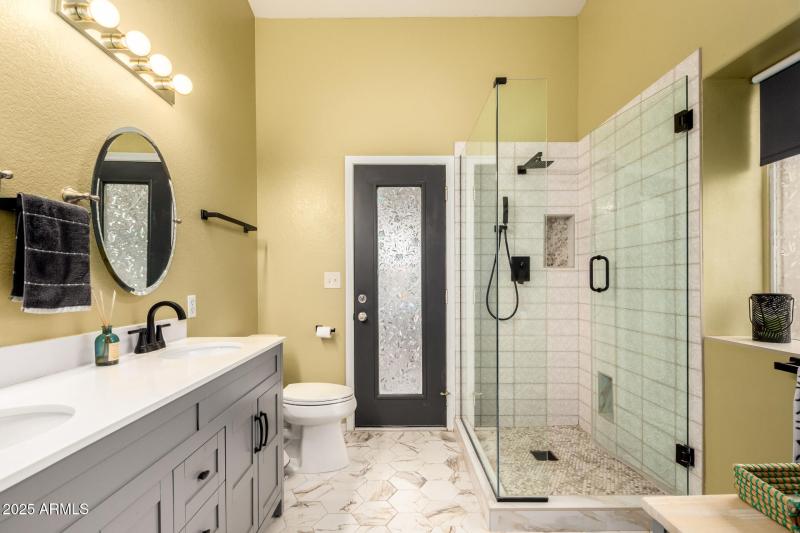 Primary Bath with exit to backyard