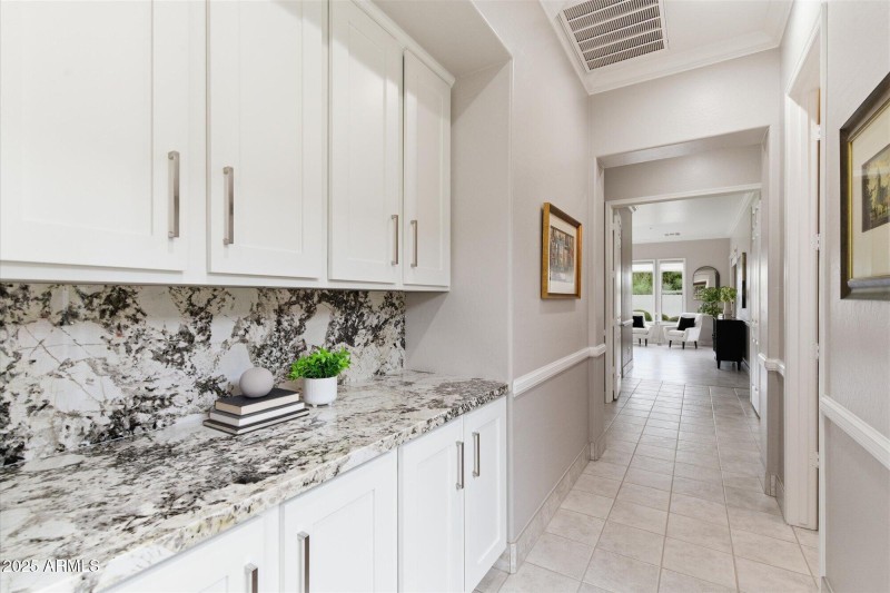 Dramatic Hallway to Primary Suite