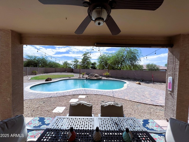 Pool view from patio huge yard