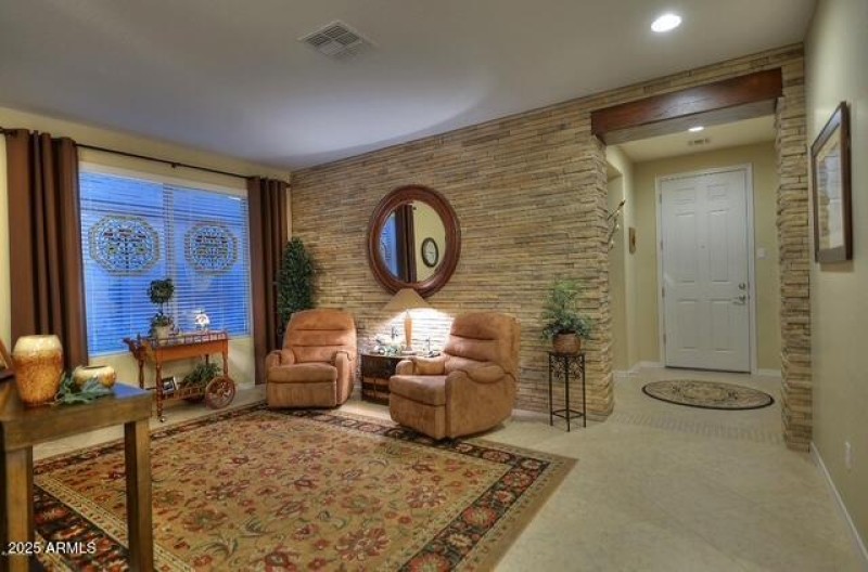 Stone Wall Behind BookCase