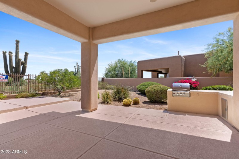 huge covered patio with BBQ