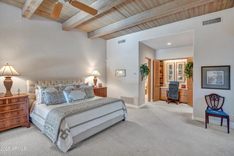 Master bedroom with hidden writing desk