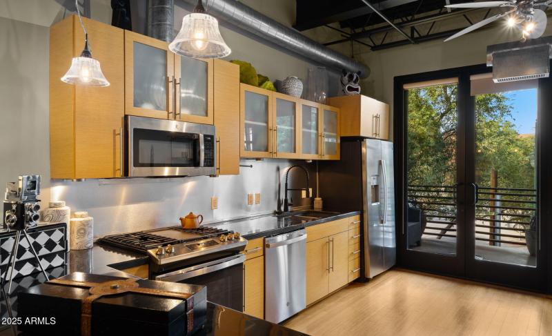 Floor-to-Ceiling Doors Lead to Patio