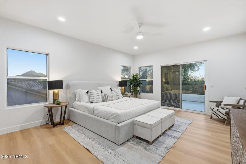 Primary bedroom with private patio