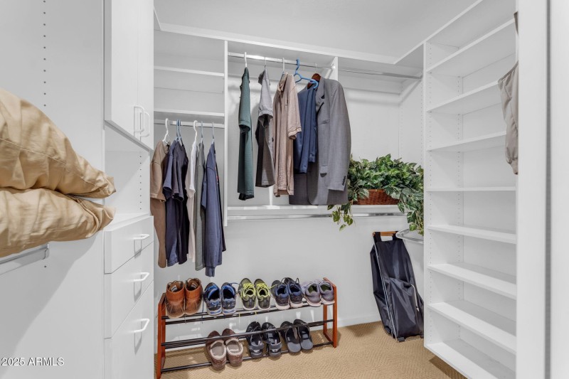Primary walk-in closet 1