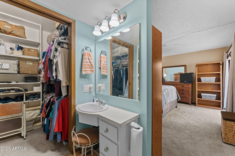 Dressing area with an extra sink