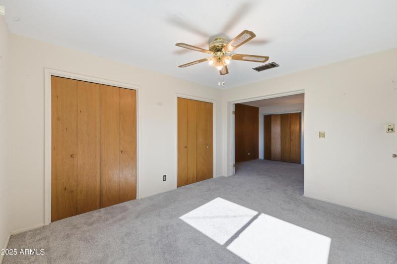 FULL WALL OF CLOSETS