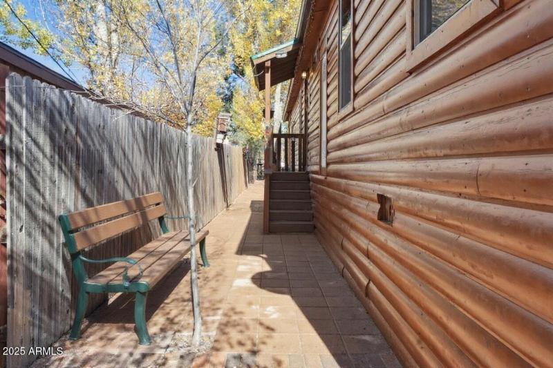 Staged Side of Home with Bench