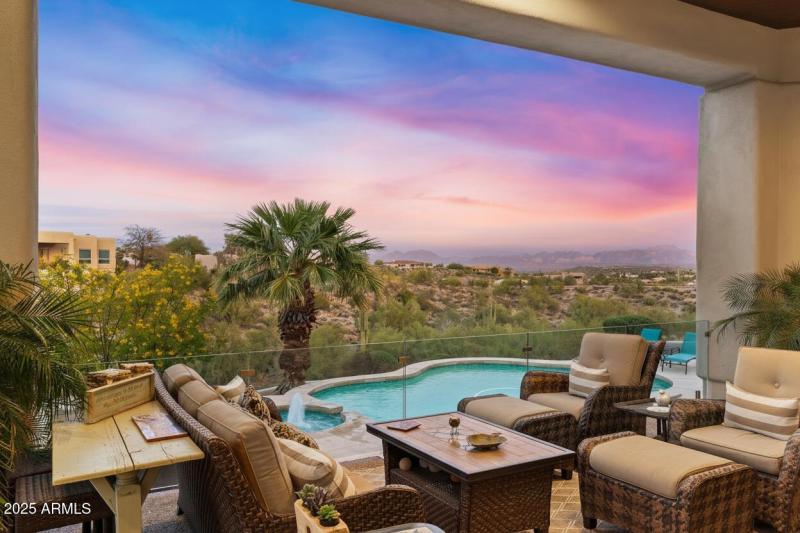 Back covered patio w/glass railings