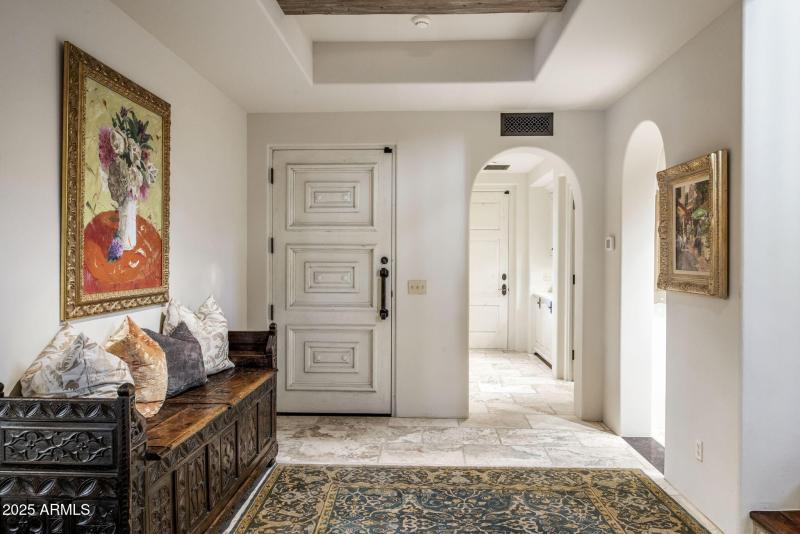 9-0200 - Foyer View rom Garage and Front