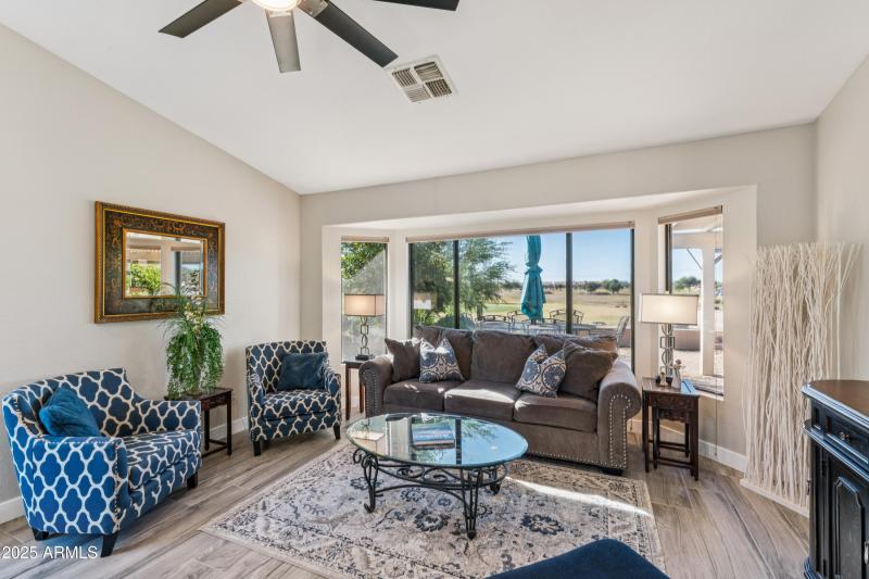 WALL OF WINDOWS IN FAMILY ROOM