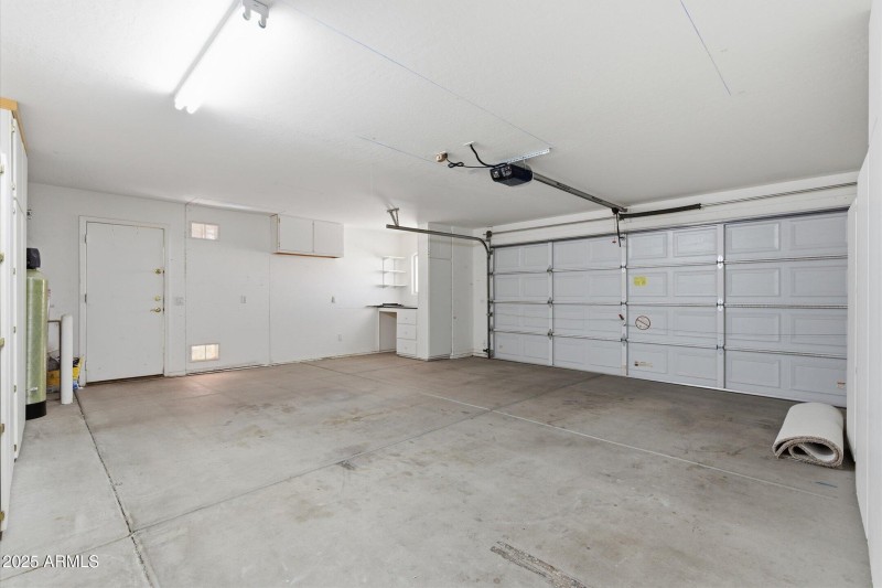 2.5 car garage with cabinets