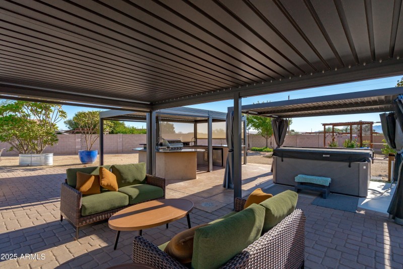 60-Covered BBQ Hot Tub and Lounge Area