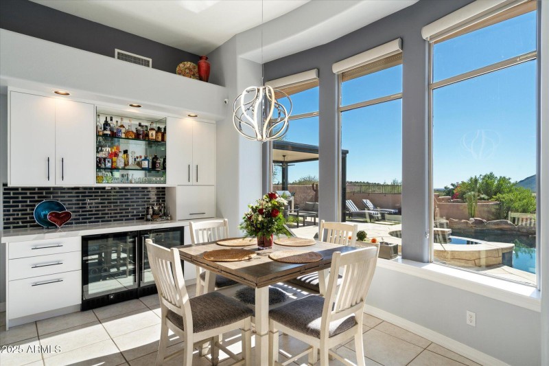 Breakfast Room with Bar and Pool Views