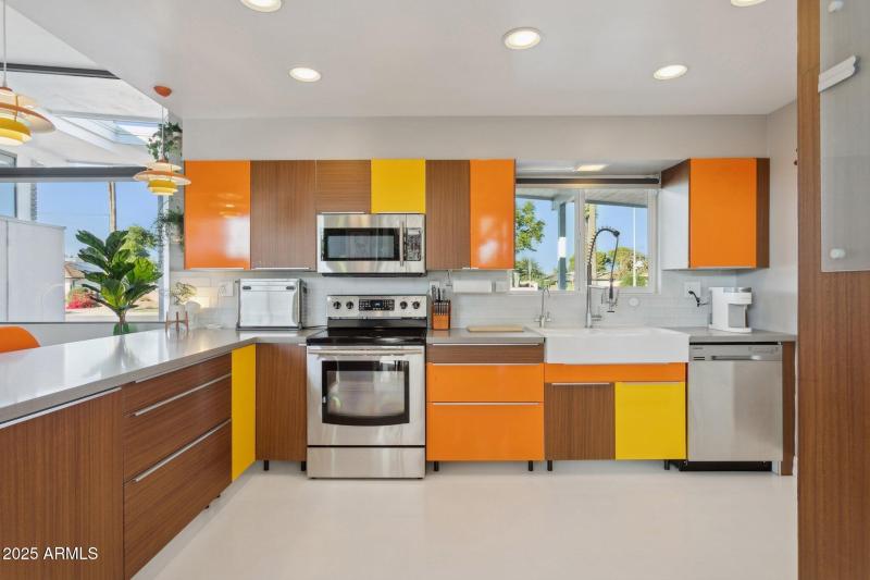 Multi-hued Euro-style cabinetry