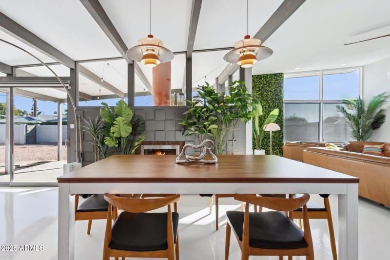 Dining room has wood-burning fireplace