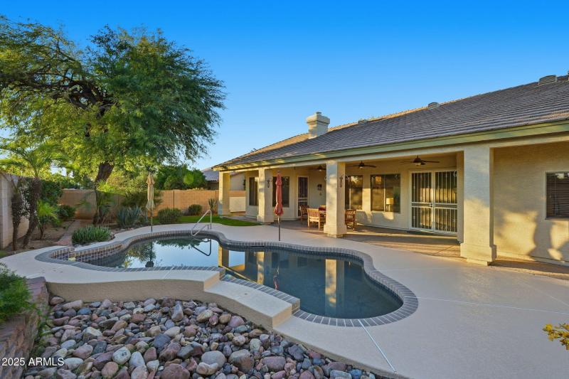 Pool with Water Features and Patio