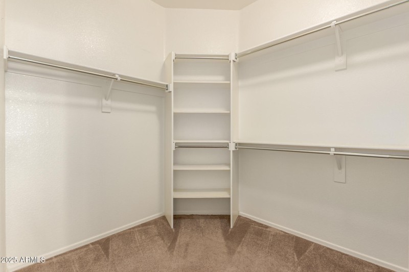 27 Primary Walk-in Closet
