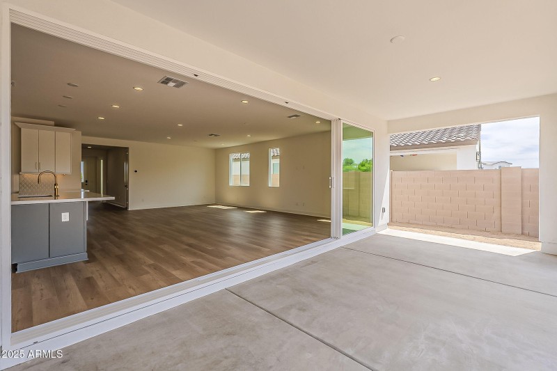 Sliding Glass Door To The Patio