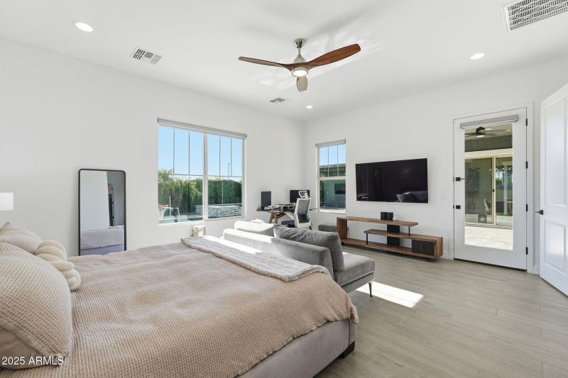 Primary Bedroom W/ Door to Patio