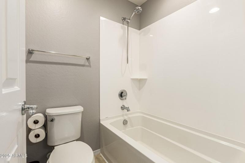 Tub and toilet in upstairs bathroom