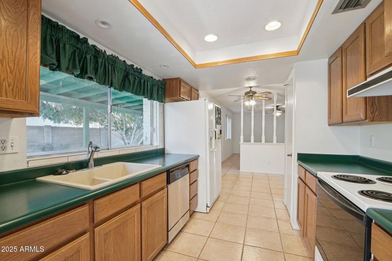 Kitchen with Sink to Backyard