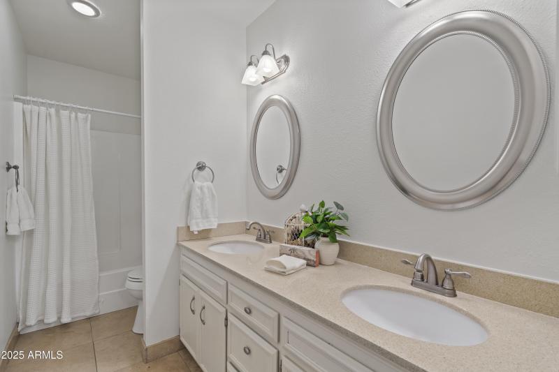Full Bathroom with Dual Vanities