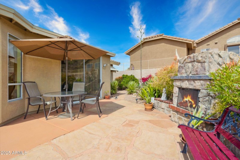 Outdoor patio and fireplace