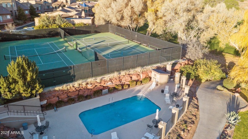 Aerial of the pool and tennis courts