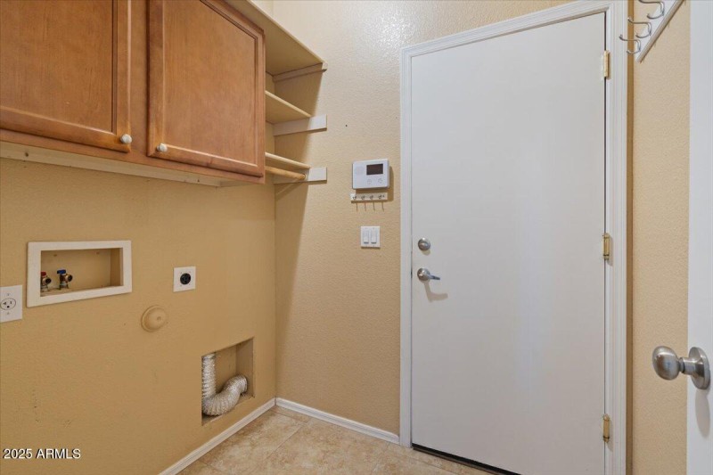 Laundry room with storage