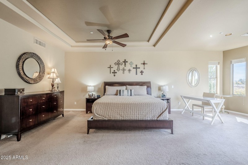 Another view of primary bedroom