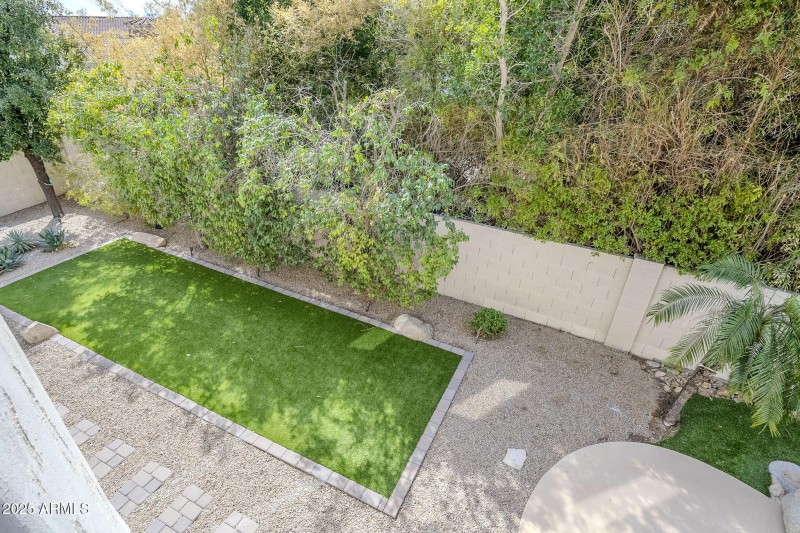 Synthetic grass area and pavers