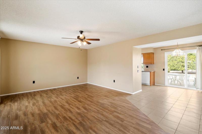 LIVING ROOM ADJOINING DINE IN KITCHEN