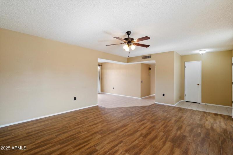 LIVING ROOM WITH STORAGE CLOSET