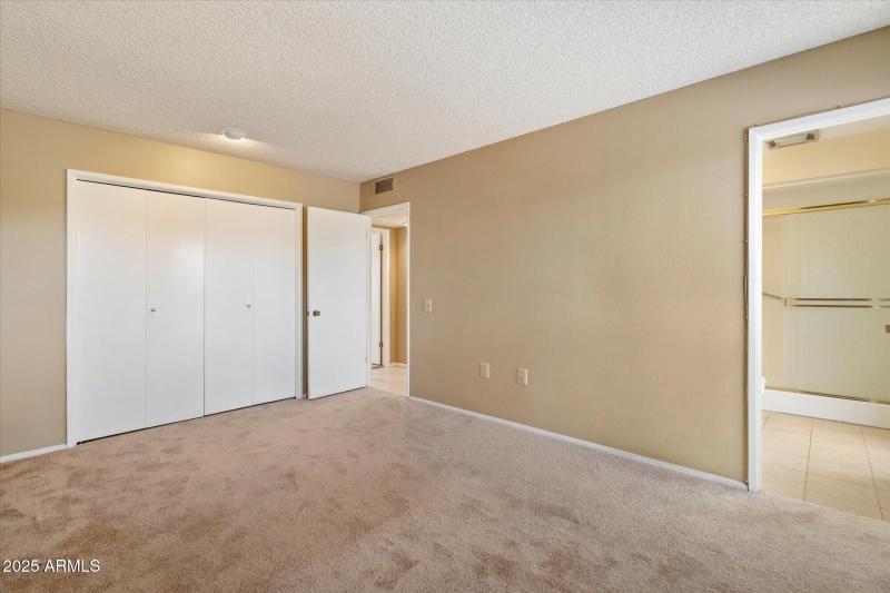 PRIMARY BEDROOM AND ENSUITE