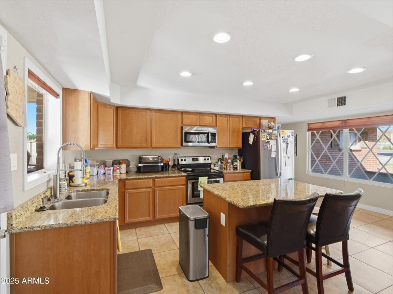 Spice Maple Cabinets with Granite Counte