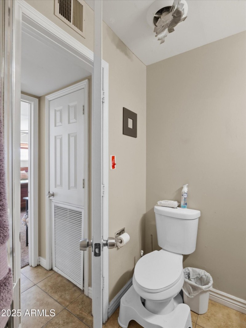 Toilet area at hall bath