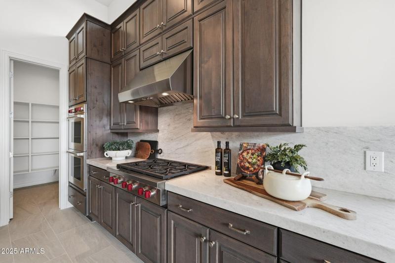 Dark Cabinetry W Neutral Backsplash