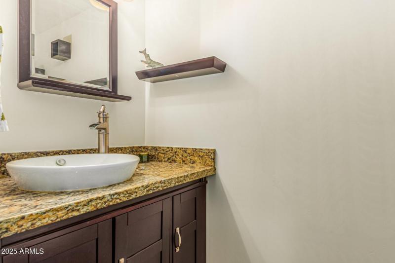 Powder Room off entry way.