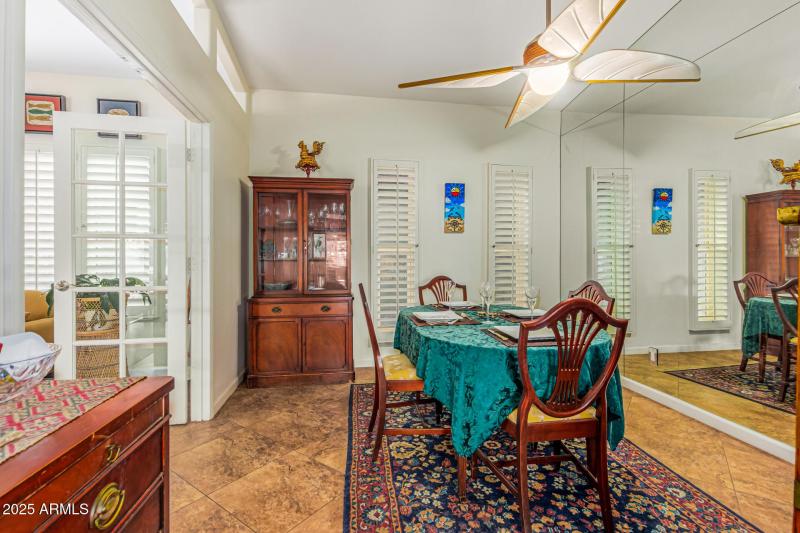 Formal dining room with french doors.