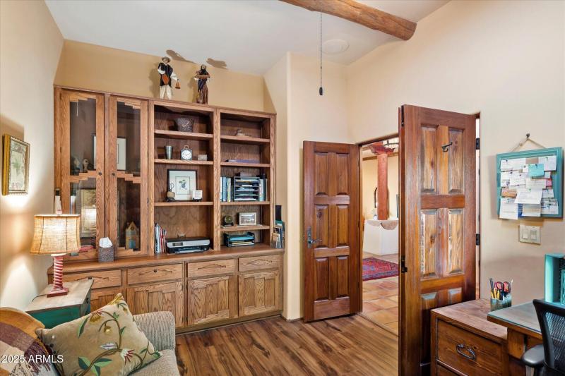 Office with Floor-to-Ceiling Shelving
