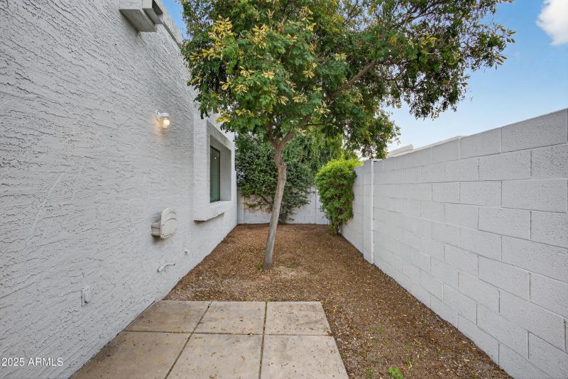 Private Patio With Walkway Access