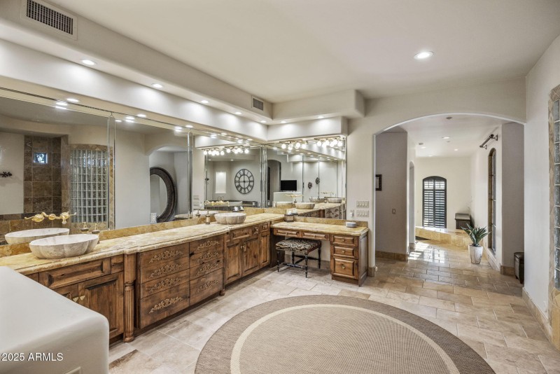 Primary Bathroom into Room